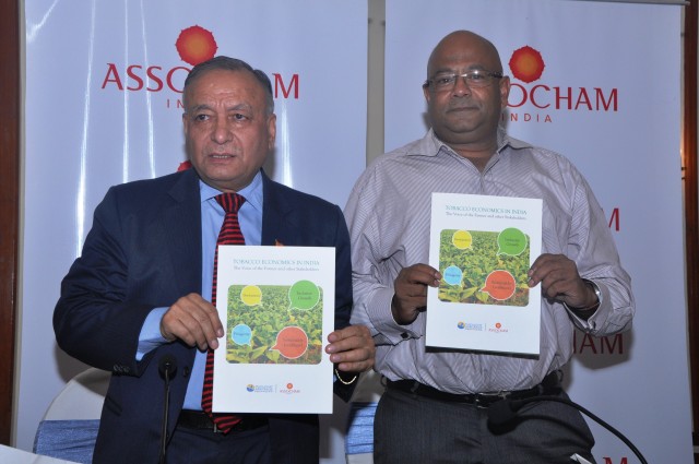 Mr. D. S. Rawat, National Secretary General, ASSOCHAM and Mr. Kaushik Dutta, Founder - TARI, releasing the report – Tobacco Economics in India – The Voice of the Farmer and other Stakeholders.